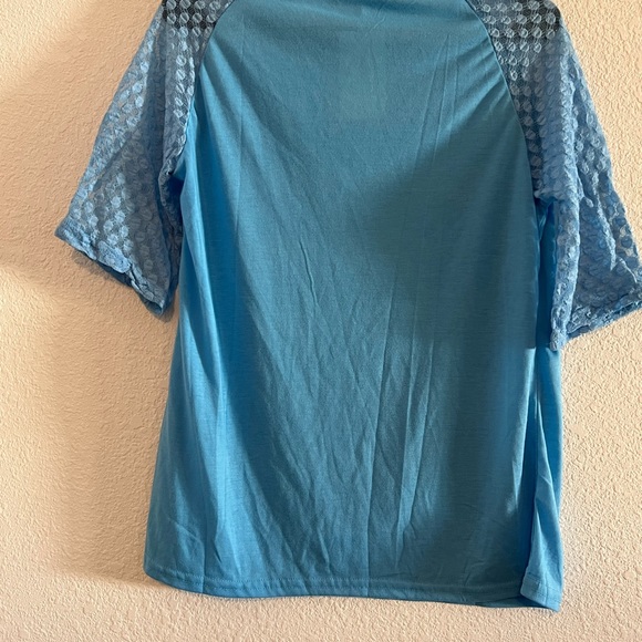 Blue lace three quarter sleeve top
Size large
Floral blooming - Picture 7 of 9